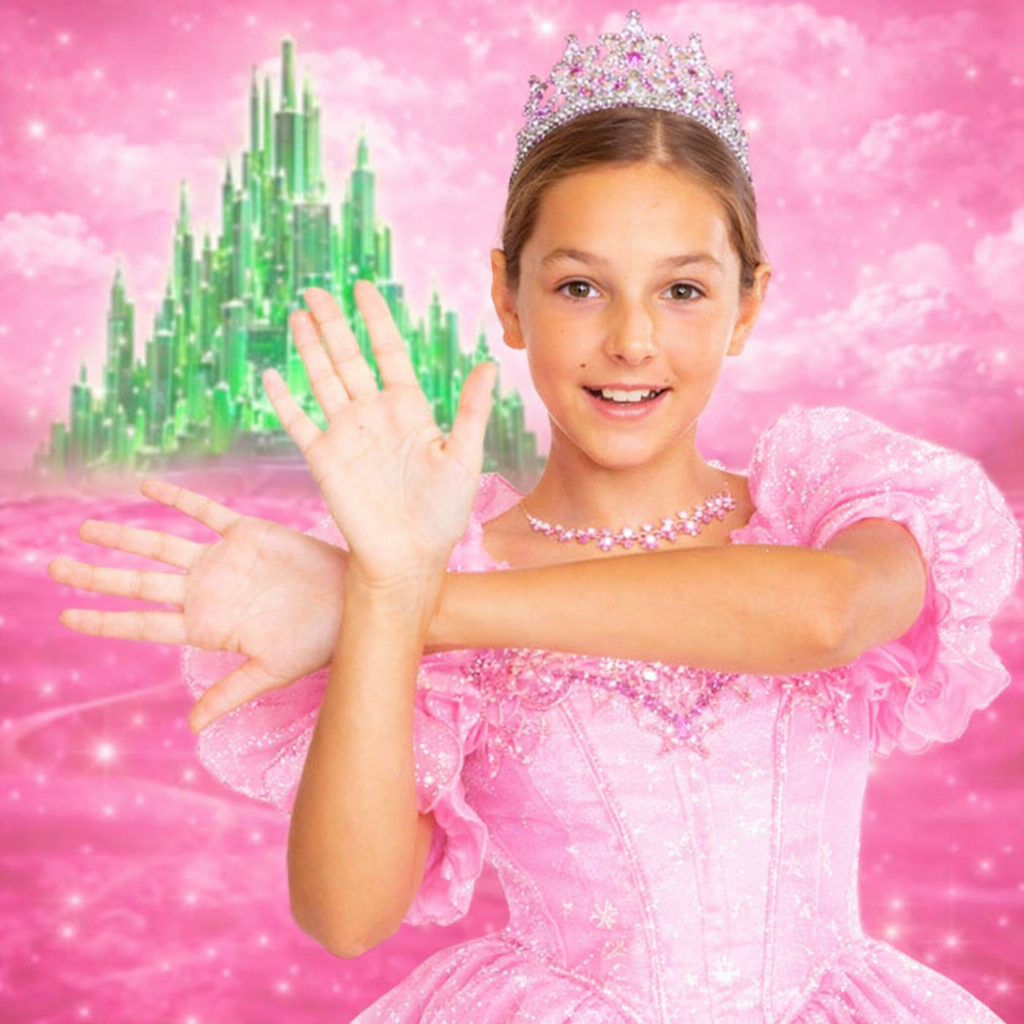 girl dressed as fairy/good witch in pink dress and tiara